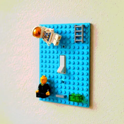24 Playfully Decorative Light Switch Plates That'll Really Light Up Your Room